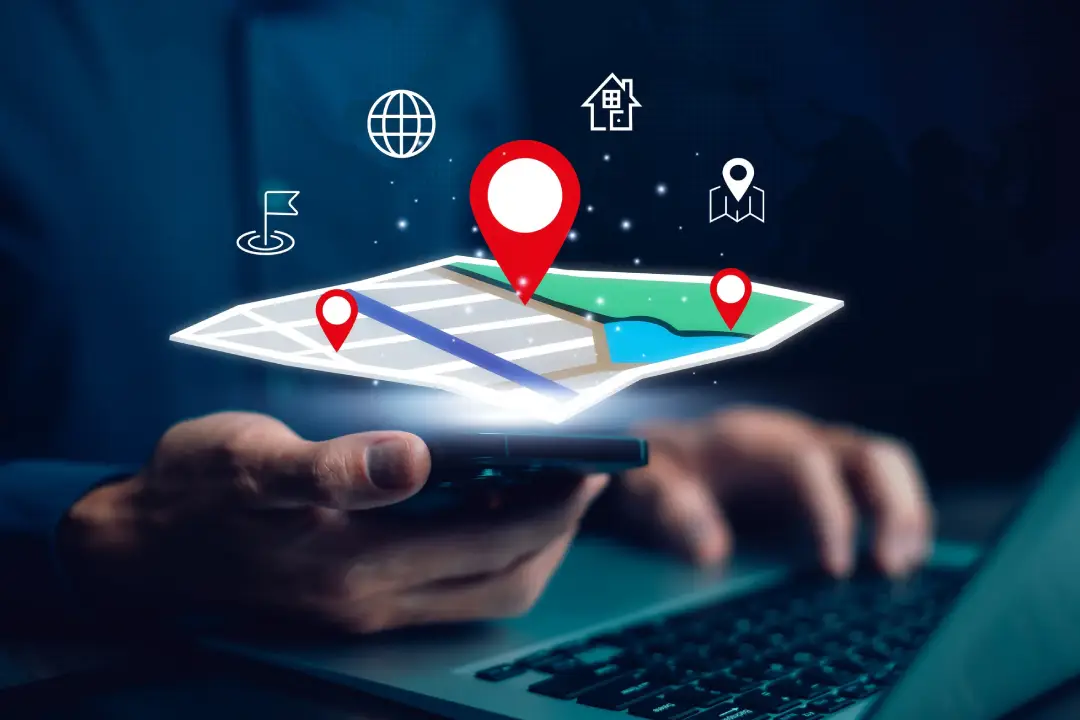 man using laptop with virtual world and model map with location point